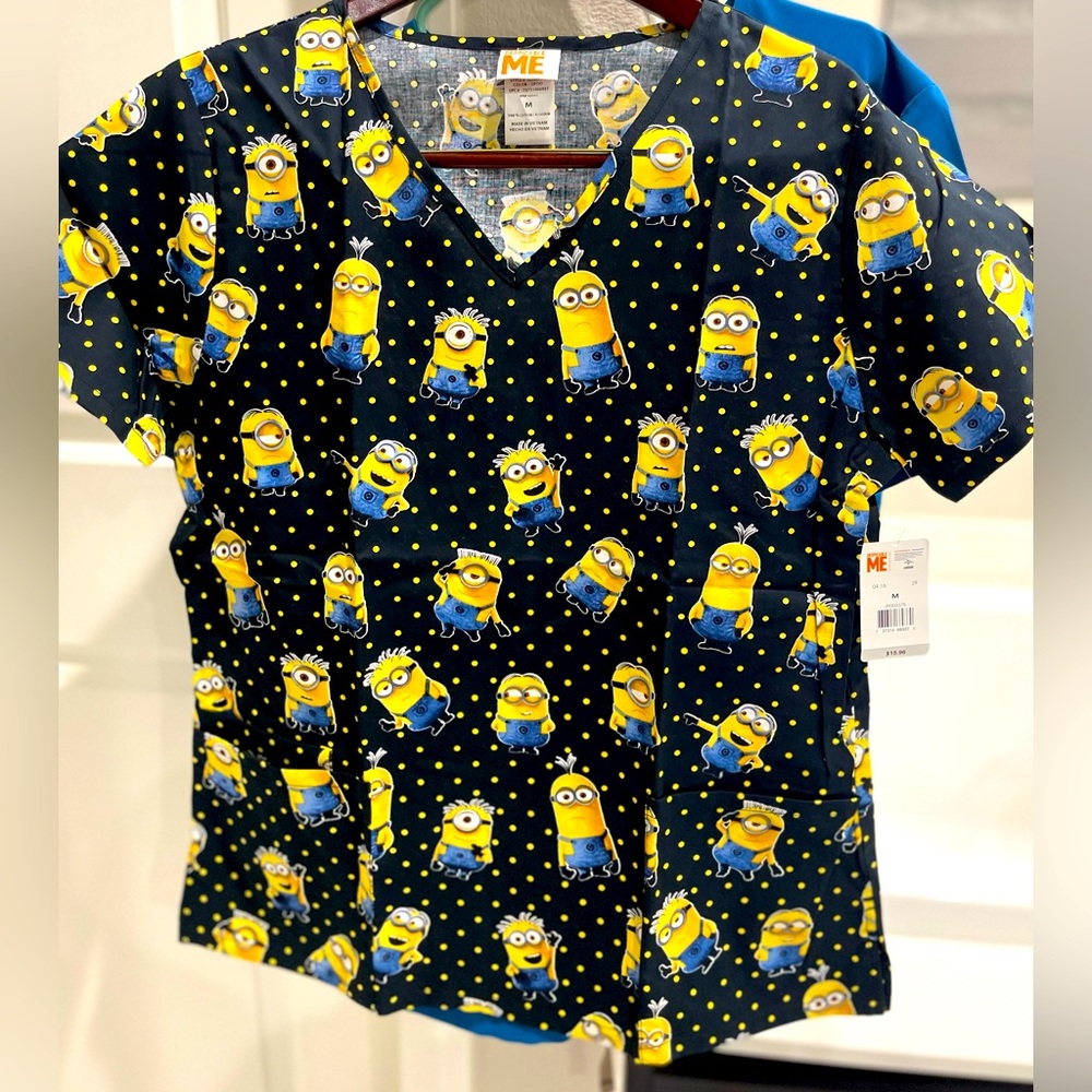 NWOT, DESPICABLE ME scrub top with 2 front pockets